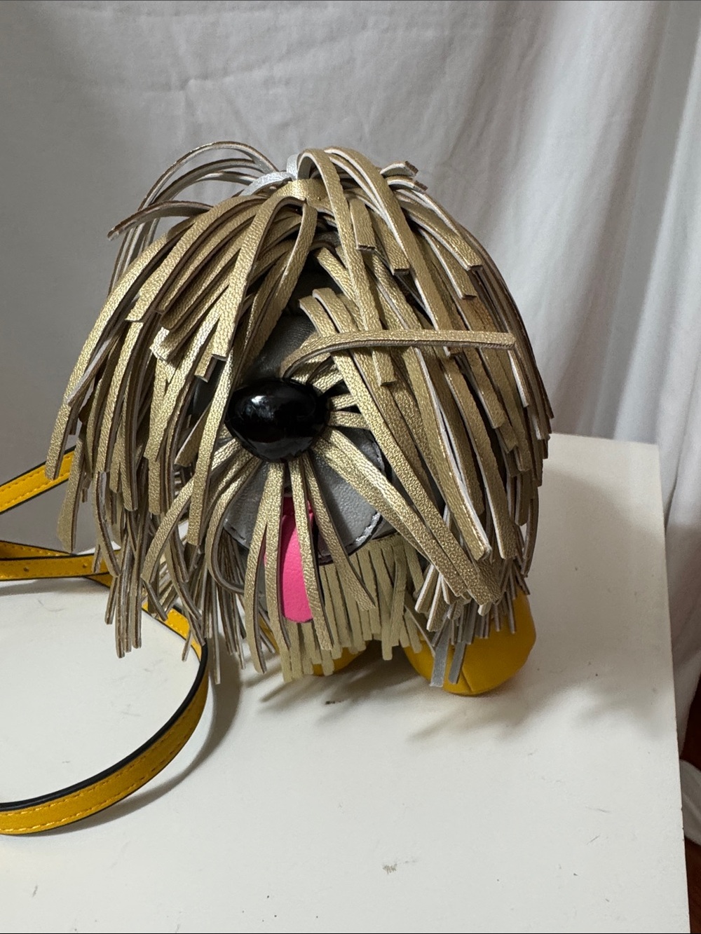 Fringed Gold Shaggy Dog Crossbody Bag with Yellow Accents